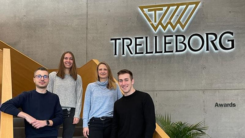 Lena, Jonathan, Hannah and Philipp on a staircase
