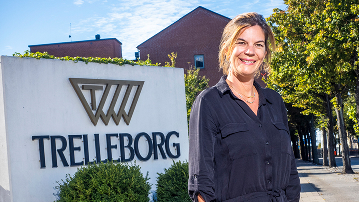 Woman in front of Trelleborg logo