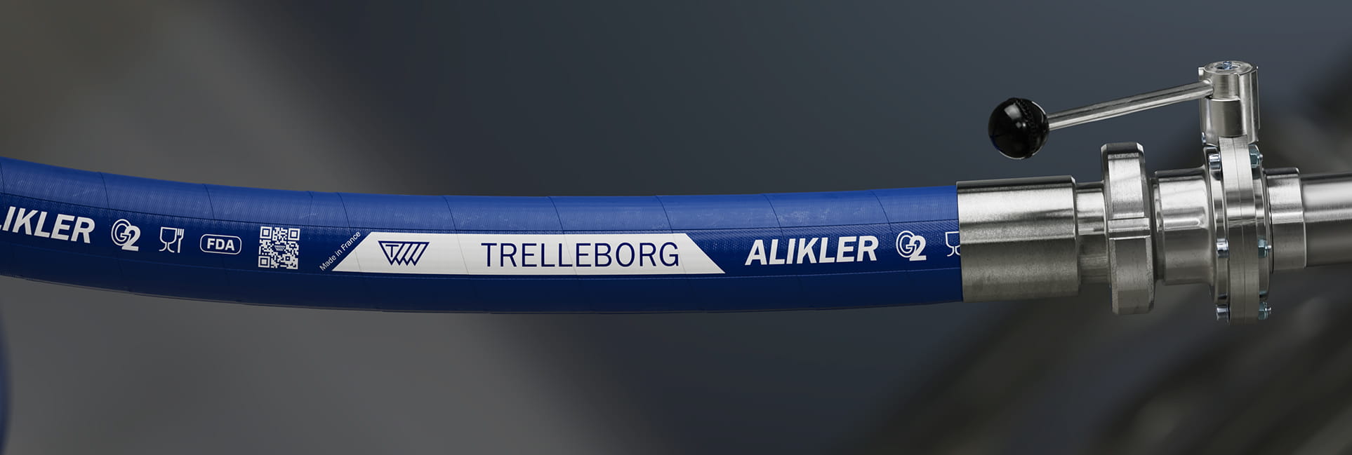 Närbild på Trelleborgs multifunktionella slang för flytande livsmedel såsom mjölk, olja och fetter