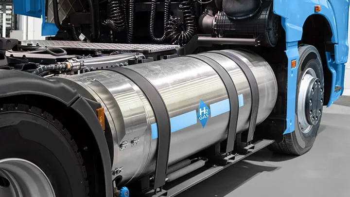 A hydrogen fuel cell semi truck with H2 gas cylinder onboard.