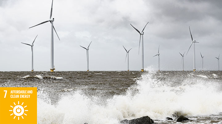 Sustainable offshore wind turbines producing clean energy on stormy sea