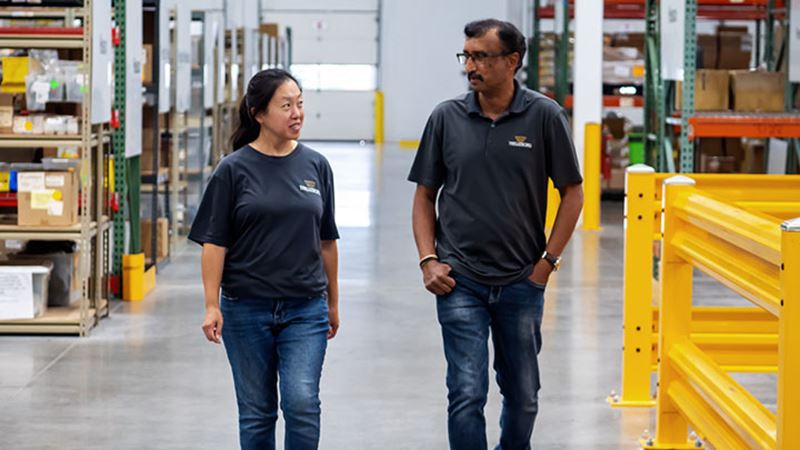 Employees walking through a Trelleborg manufacturing facility, reflecting operational work linked to the company’s climate and sustainability efforts