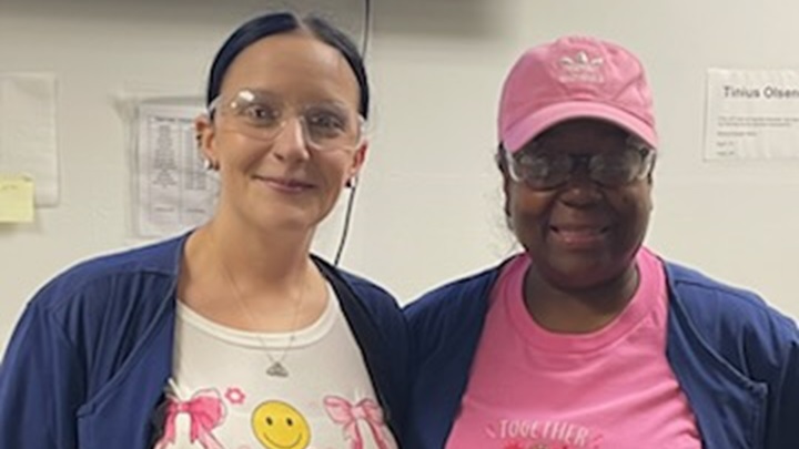 Women wearing pink in honor of breast cancer awareness