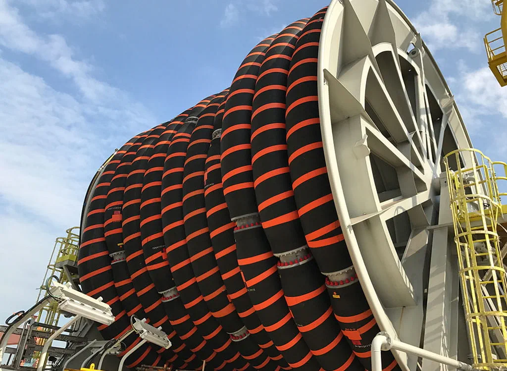 reeline offshore hose on reel