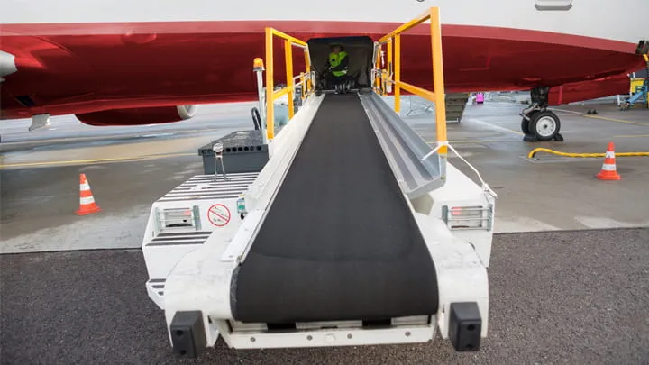 Ground support system: a conveyor belt for loading luggage onto aircraft