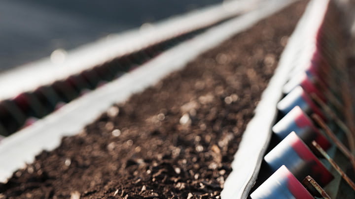 Anti-abrasive conveyor belt