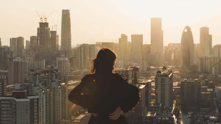 Woman looking at a city