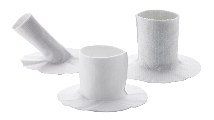 Set of three white cylindrical lateral connection rehabilitation liners with flared bases, designed for flexible and trenchless pipe repair