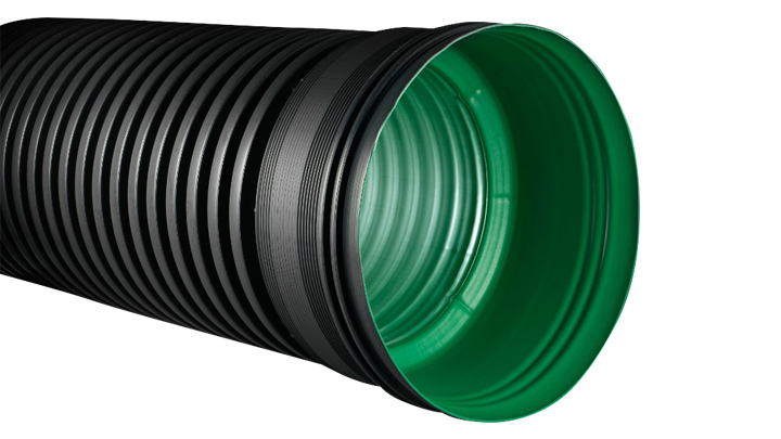 Green and black corrugated pipe