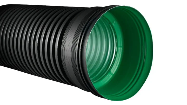 Green and black corrugated pipe