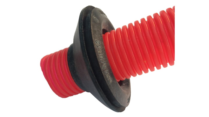 Trelleborg 570 - Flexible connector on a red corrugated pipe