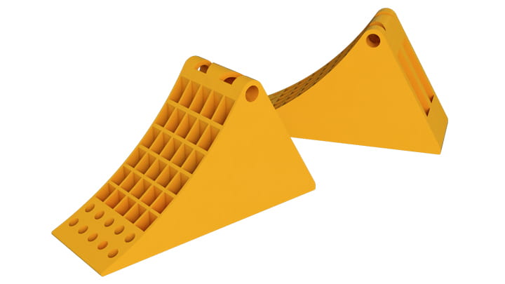 Vehicle wheel wedges used to prevent a vehicle from moving by securing the wheels in place