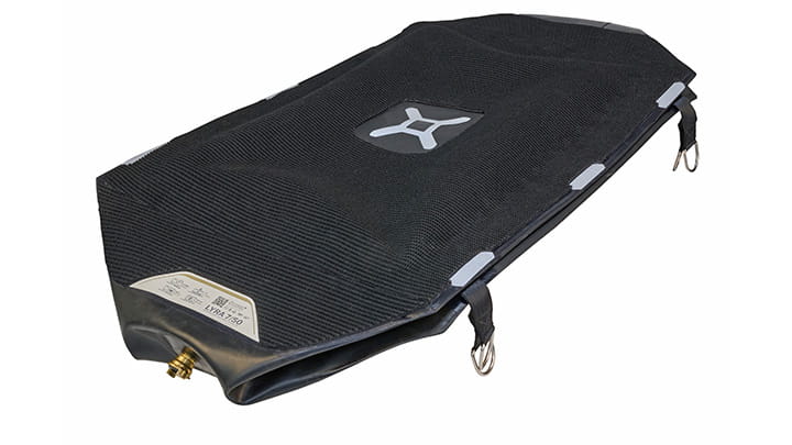 Lyra lifting bag with textured black surface, side valve, and securing straps, shown against a clean white background.