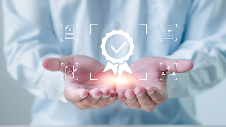 Hands presenting a digital quality certification icon, symbolizing reliability and compliance in sealing profile products