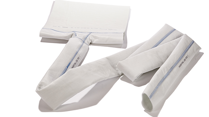 White fabric-textured cylindrical components with curved and angled designs, used in trenchless lateral connection rehabilitation systems