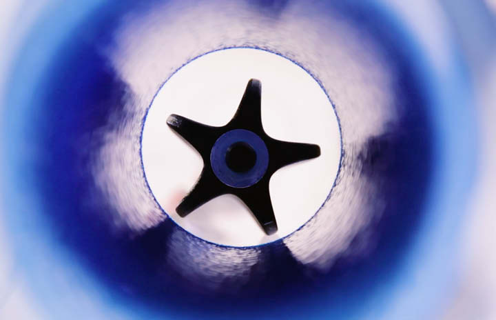 The Spraypoxy spray coating head in action during the pipe coating process