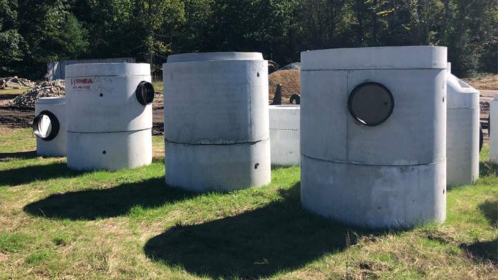 Manholes on the field with installed connectors