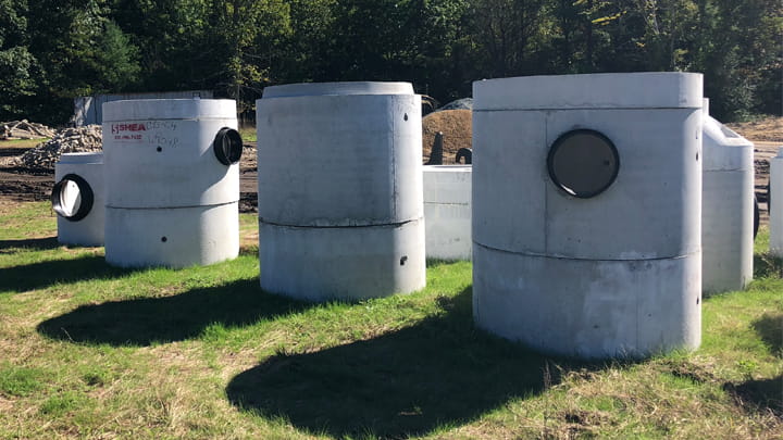 Manholes on the field with installed connectors